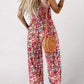✨ 50 % RABATT NÅ! 🌼 Blomstret, ermeløs jumpsuit for damer – smocket brystparti og vide ben – sommerlig chic 👒�