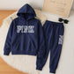 Unisex ensfarget oversized hettegenser og joggebukse sett