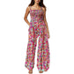 ✨ 50 % RABATT NÅ! 🌼 Blomstret, ermeløs jumpsuit for damer – smocket brystparti og vide ben – sommerlig chic 👒�