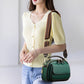 Moteartikler - Elegant dobbelt lags crossbody veske med bred stropp
