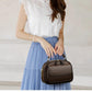 Moteartikler - Elegant dobbelt lags crossbody veske med bred stropp