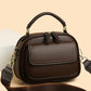 Moteartikler - Elegant dobbelt lags crossbody veske med bred stropp