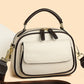 Moteartikler - Elegant dobbelt lags crossbody veske med bred stropp