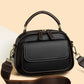 Moteartikler - Elegant dobbelt lags crossbody veske med bred stropp