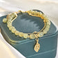 Falsk Hetian Jade gullblad armbånd