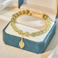Falsk Hetian Jade gullblad armbånd