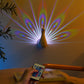 Peacock Projeksjonsvegglampe med fjernkontroll