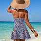 Sexy badedrakt med sideslips på stranden