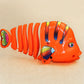 Plastleker med roll-up fisk