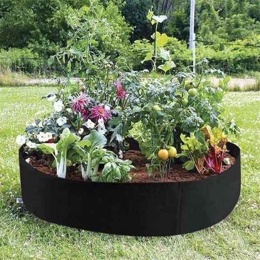 Runde, opphøyde hagesenger i stoff for planting av krydderurter, blomster, grønnsaker og potetplanter